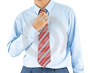 Male wearing blue shirt and red tie with clipping path