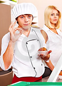 Male wearing chef uniform.