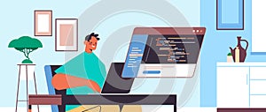 Male web developer using laptop creating program code development of software and programming concept