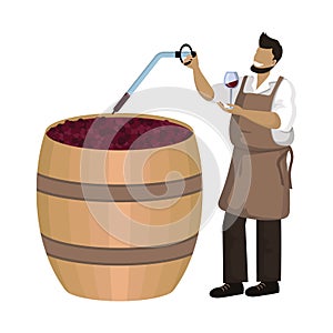 Male winemaker checks wine during fermentation process in large wooden vat. Winemaking, maceration, fermentation