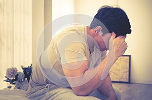 Male woke up on bed with headache and stress out