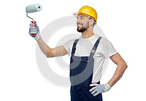 Male worker or builder with paint roller