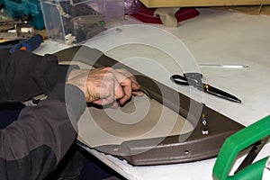 A male worker does manual work on skinning