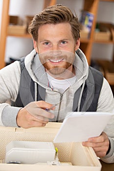 male worker doing stocktaking product