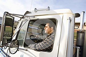 Male Worker Driving Truck