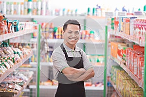 Male worker at grocery store