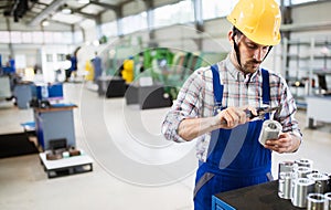 Male worker and quality control inspection in factory