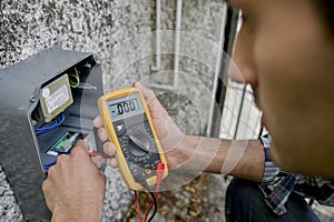 male worker reading meter