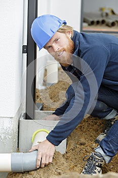 male worker repair broken pipes