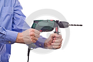 Male worker's hand holding electric handy drill