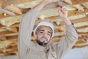 male worker on suspended ceilings