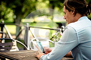 Male working on mobile phone