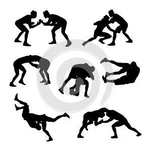 Male Wrestling Silhouette Poses. Vector Art