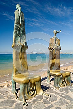 Malecon Statues photo