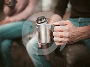 Males Hand With Cup And Thermos, Camping Break