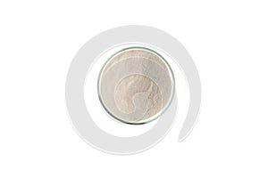 Malic acid or oxyantaric acid powder in Petri dish on white background, top view. Food additive E296, preservative used in the