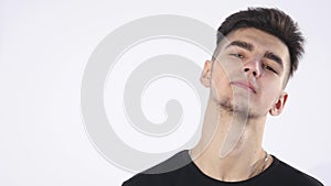 Malicious and serios man portrait - isolated over a white background