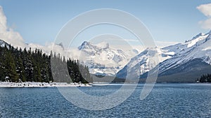 Maligne Lake in Jasper National Park, Snow-capped mountains towering above the lake. Canadian Rockies. Canada