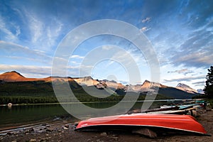 Maligne Lake at Sunset - red boats in Jasper NP, Canada