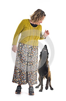 malinois and woman in studio