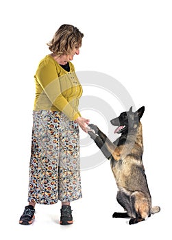 malinois and woman in studio