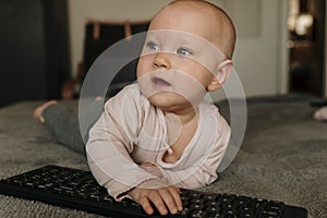 Mall child grabs a mouse and keyboard, internet addiction from an early age