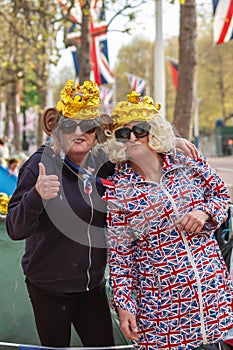 THE MALL, LONDON - 4 May 2023: Royalists outside of Buckingham Palace ahead of the Coronation of King Charles