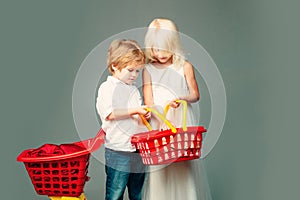 Mall shopping. Buy products. Play shop game. Cute buyer customer client hold shopping cart. Girl and boy children