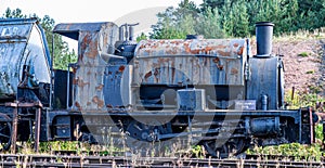 Malleable No.5 saddle tank steam engine with rusting paintwork