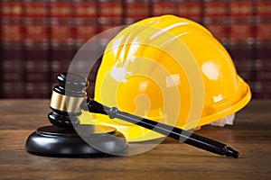 Mallet And Yellow Hardhat In Courtroom