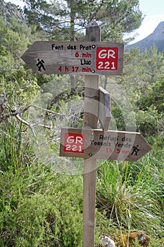 Mallorca, Spain - 12 June, 2023: Signposts for hikers on the GR221 trail, Tramontana Mountains, Mallorca photo
