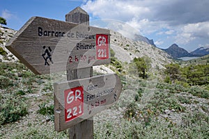 Mallorca, Spain - 12 June, 2023: Signposts for hikers on the GR221 trail, Tramontana Mountains, Mallorca photo