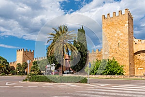 View of street and city wall in Alcudia, Mallorca