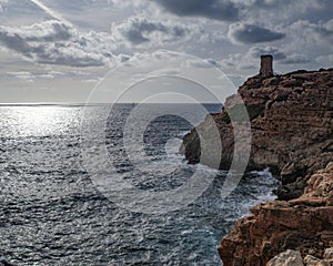 Mallorca, Spain - Oct 22, 2023: Tor de Cala Figuera and Lighthouse on the island of Mallorca