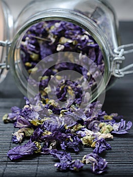 Mallow dried flowers coming out of jar