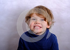 Malocclusion of the boy photo
