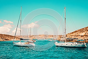 Malta Blue Lagoon and mountainous coast beauty water and boat