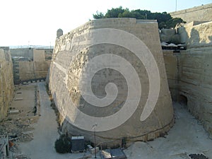 Malta La Valletta giant limestone ramparts roundly shaped old town fortification