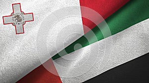 Malta and United Arab Emirates two flags textile cloth, fabric texture