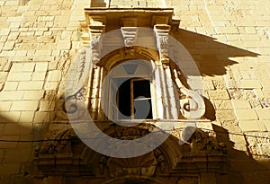 Malta, Valletta, the streets of the city, window of the old house (St. Christopher\'s Street