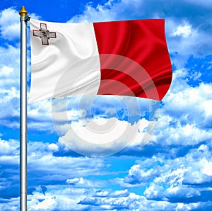 Malta waving flag against blue sky