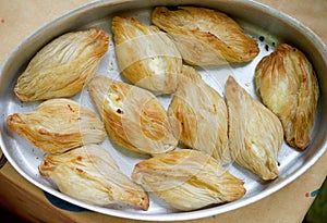 Maltese baking delicacy, pastizzi. Pastizzi, typical street food. Maltese pastas with ricotta and peas. Maltese food. Photo from