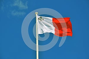 Maltese flag on blue sky