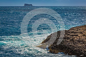 Maltese rocky coast and Filfla island