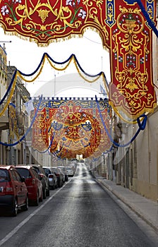 Maltese street decorated on religious feast time. Paola, Malta photo