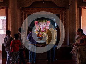 Devotees inside Lord Ganesh temple in a village in India