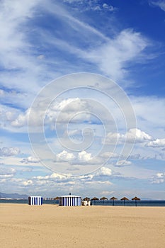 Malvarrosa sand beach in Valencia Spain blue sky photo