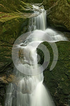 Maly Falls in super green forest surroundings, Czech Republic