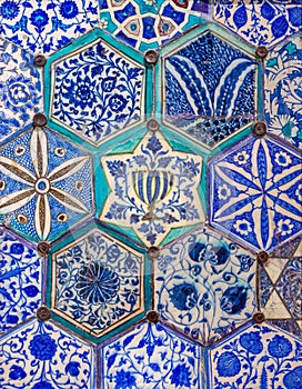 Mamluk era glazed ceramic tiles decorated with floral ornamentations photo