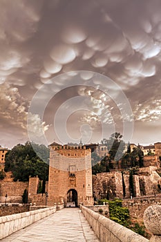 Mammatus clouds over Alcantara Bridge in Toledo